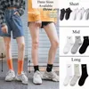 Sokken voor mannen Designer Sock Women Underwear Kousen Grip Socks Motion Cotton Solid Color Classic Ademende zwarte Wit Basketball voetbal Sportheren Sokken