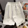 100% Pure Cotton American Sports Shorts för män Kvinnor i kvinnors sommarklänningar lösa och mångsidiga dragskontrend