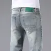 Lumo leggero estate sottile morbido elastico jeans per acqua di lavaggio per uomo Slimt fit piccolo tubo dritto di fascia alta pantaloni casual europei