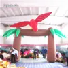 Arco di palme gonfiabile all'ingrosso 4m di larghezza 13 piedi Archway soffiato con un uccello pappagallo per la decorazione del parco a tema della giungla