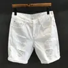 Summer Mens Fashion White Hole Washing Denim Shorts loisirs Stracted Beggar Straight Short Pantals 240422