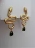 Boucles d'oreilles bijoux modernes Neignel Boucles d'oreilles de serpent Personnalité Cool Metallic Gold Couleur en verre vert Lignes d'oreilles pour femmes Gift 230831