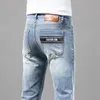 Jeans masculin printemps d'été mince masculin slim slim américain calicon marque haut de gamme petit pantalon droit Q9574-07