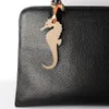 Doppelte Gesichter niedliche echte 100% Full Getreide Leder Pferd Seahorse Hirsch HobbyHorse Schlüsselbund -Rucksack Anhänger Tierfrauen Taschen Charme 240428