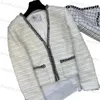 Дизайнер женской куртки ранней весны Новая знаменитость тяжелая промышленность Плетена ручной алмазной и универсальной толстой твидовой пальто