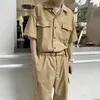 Herrenhose Männliche Mode mit Ledergürtelbeutel Männer Fracht Overall Streetwear Koreaner Taschen Taschen Kurzarmknopf Jumpsuits Frauen