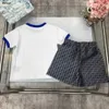 Testes de bebê de luxo Ternos de verão roupas infantis roupas de grife de designer de 100-150 cm de camiseta bordada e shorts impressos de dinossauros de dinossauros 24April