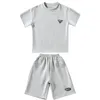 Vêtements pour enfants garçons d'été jacquard tissage t-shirt short 2 pièces set teenage boy ventilate tracksuit stéréoscopic lignes tenue 240426