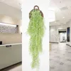 Fleurs décoratives 115 cm Golden Bell Willow Mur de simulation suspendue Panne de décoration de plante Orchidée Vine Plastique Fleur artificielle