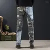 Jeans de jeans Splicing Camuflagem para homens Macho de cowboy machado com calças com bolso calça 90