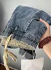 Jeans masculins denim de mode coréen d'été avec taille élastique et pantalon harem Design Drawtring vintage Baggy Man