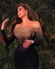 Czarny seksowny vintage z ramienia długie rękawy wieczorne sukienki z koralikami cekinowo -syrenki suknie balowe 2024 najnowsze