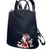 Kvinnors broderade ryggsäck, enkel och fashionabla Oxford-tyg trendiga kvinnors väska, avancerad broderad väska, medelålders grossist