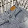 Jeans femininos de grife do início da primavera Novo estilo casual de estilo original angustiado e angustiado Bordado