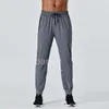 Designer långa byxor män sport springa anpassa yoga utomhus gym fickor smala passform tröjor pant jogger byxor mens casual elastic midje gym sportig