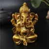 Décorations Gold Lord Ganesha Statue Bouddha Elephant Hindu God Sculpture Figurines Résine Home Garden Decoration Bouddha Statues For House