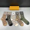 Men's and women's stockings sports cotton socks luxury socks Joker solid color classic hook ankle breathable black and white basketball football garter box.