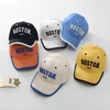 Caps chapeaux coréens alphabet children chat de baseball garçons et filles coréennes solides chapeau soleil printemps / été ajusté pour enfants ajusté pied hatl240429