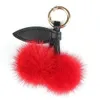 Leuke grappige donzige echte nertsenbont pompom kersenauto sleutelhanger voor sleutels bont pom key chain dames tas charme rugzak hanger 240428