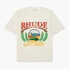 Luxo Rhuder Brand Designer T Shirts Sunshine Palm Tree Tree Cadeira de praia Impresso High Street Fashion Cotton Luva curta com 1: 1 logotipo