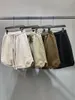 Shorts femininos espelhos de rowling de cor sólida versátil bolsos de verão casuais calças vintage aconchegantes 2024