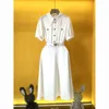 Designer Kvinnor Plaid Letter-tryck Skjorta Dress Women's Open-Neck-knapp-up Vintage Randig kortärmad bälte klänning svart och vit aprikosklänning B25