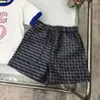 Testes de bebê de luxo Ternos de verão roupas infantis roupas de grife de designer de 100-150 cm de camiseta bordada e shorts impressos de dinossauros de dinossauros 24April