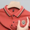 Brand 2024 Summer Mens Cotton Short Short Shinded Stamping Stamping Shirt Shirt Luxury Business T-shirt Casual Lapel Top 240428