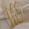 3st Gold Color Twist rostfritt stål Bangle Armband Chic Classic Tibetan Buddha Armband Gyllene staplade armband för kvinnor 240428