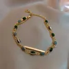Chaîne à la mode et à l'imitation verte exquise Bracelet de perle de jade Banquet élégant et de style de la cour douce Banquet quotidien pour femmes