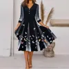 Lässige Kleider Frauen Mode elegante Positionierung Schmetterling bedrucktes Midi -Kleid gegen Hals Langarmknopf Lose Swing Party