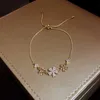 Kette luxuriöser Goldfarbe Verstellbares Blumenarmband Neue trendige hochwertige fortschrittliche Armbandparty Schmuck Geburtstag Geschenk