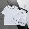 デザイナースポーツセットブランドデザイン新しいメンズTシャツ夏ピュアコットンカジュアルラウンドラウンドネックプルオーバープリントブラックアンドホワイトレターラグジュアリージャケットショーツセットM-3XL