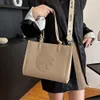 Luxury Brand Bag Designer Discount Handväska Tote Bag Womens Ny trend Fashion Casual Korean Handheld präglade stor kapacitet en axel crossbody