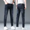 Jeans Blue Spring e Autumn Style Mens Busin Calças elásticas Slim Fit Small Feets Versátil lavado para homens