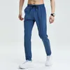 Gym Fitness Trousers Mens Pencil Pants Tight Jogging Running Breattable QuickDrying Ice Silk Sports Wind Casual Fashion 240412