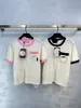 426 2024 Runway Sommermarke gleiche Style Kurzarm rosa schwarzer Flora -Print Crew Neck Mode Kleidung hochwertige Frauen Weilae393