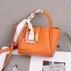 Sznurek pomarańczowy kosz na torbę 2024 Designerka o dużej pojemności torebki z osłoną