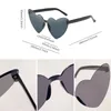 Kvinnor Fashion Rimless Colors Söta heteromorfa hjärtform Solglasögon UV400 Vintage Tinted Party Girls Female Sun Glasses 240429