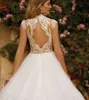 Vintage Long High Necy Lace Dentelle Robes de mariée A-Line Ivory Tulle Sweep Train Vestido de Novia Boutons couverts Back Bridal Bridal Bridal