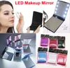Ny LED -makeup spegel kosmetiska smink lampor bärbara vikfickor lady spegel resor 8 LED -lampor tändes i lager DHL SHI5857828