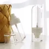 Bouteilles de rangement pulvérisation inversée transparente vide fine brume en plastique mini mini bouteille de voyage rechargeable les contenants liquides de maquillage outil de maquillage salon