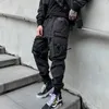 Calça masculina unissex multi-bol bolsa elástica na cintura macacão roupas harajuku hiphop streetwear fita leggings calças de moletom