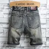 Brand mass retro estilo rasgado shorts jeans 2024 Moda de verão Casual Hole Patch Jean Male Roupos Y240422