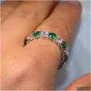 Anéis de casamento Jóias de luxo da marca brilhante 925 Sterling Sier Round Cut Emerald Zirconia Women Band Circle Ring Drop Drop Deliver