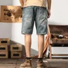 Summer Mens Mens Perfoated Denim Shorts coréens Version Pi Shuai Street Trend High Quality Loose Blue Blue Jeans 240415