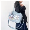 Bolsa de bebê Bolsa coreana Bolsa de dor japonesa Bar transparente PU PU MOLA MENINA BACA DE ombro de estudante Bolsa quadrada de anime Messenger Bag