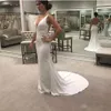 Deep V Straps Meerjungfrau Designer Kleider Hals sexy Rückenless Satin Sweep Zug bedeckte Knöpfe Rücken Strand Hochzeitskleid Vestido de Novia Estido