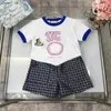 Fashion Baby Tracksuits Sommeranzüge Kinder Designer Kleidung Größe 100-150 cm Dinosaurier Stickt-Shirt und Buchstaben gedruckte Shorts 24APRIL