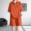 Spares de canciones para hombres Polo de polo de medio cremallera de verano más tendencia de traje grueso manga corta suelta set de dos piezas para hombres camisetas